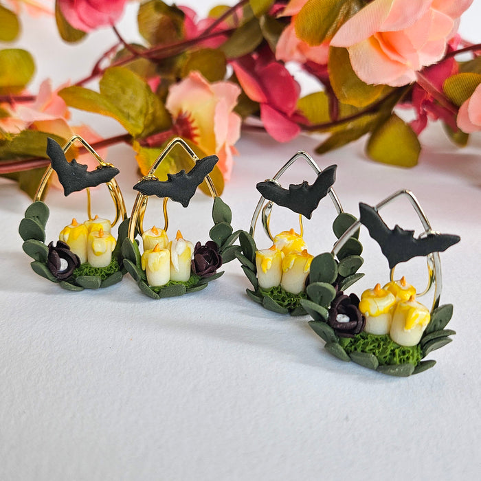 Candles, Bat and Flower